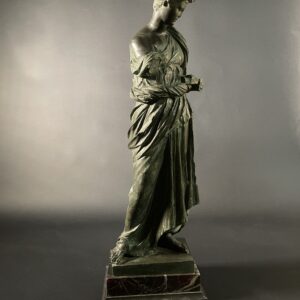 Maiden of Anzio by Nisini, bronze in the neoclassical taste on a polychrome marble base.