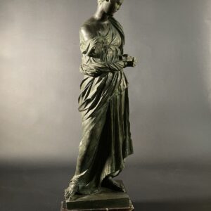 Maiden of Anzio by Nisini, bronze in the neoclassical taste on a polychrome marble base.